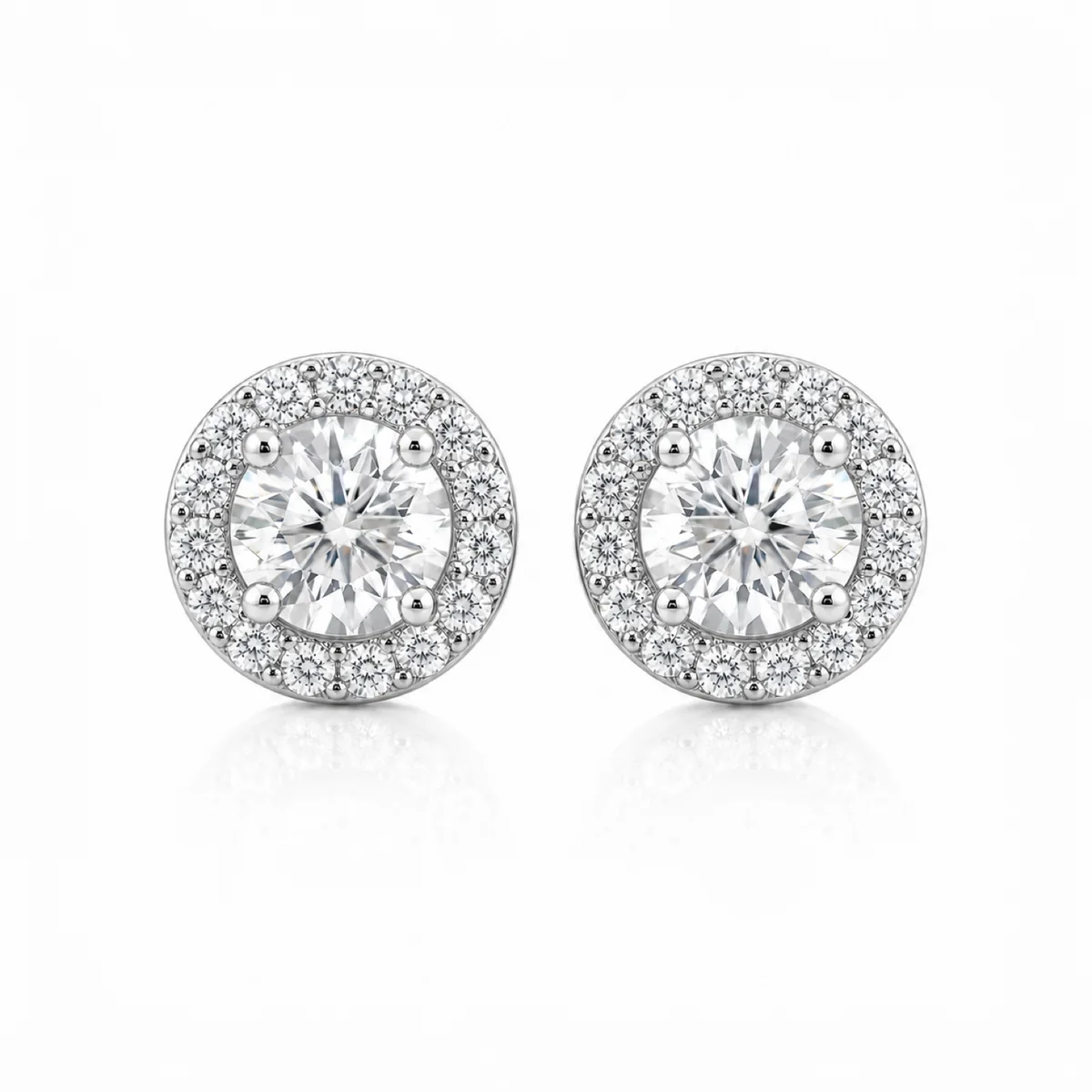 Halo studs diamond earrings in platinum, round diamond, made to order by Prodiam (rendered design reference)