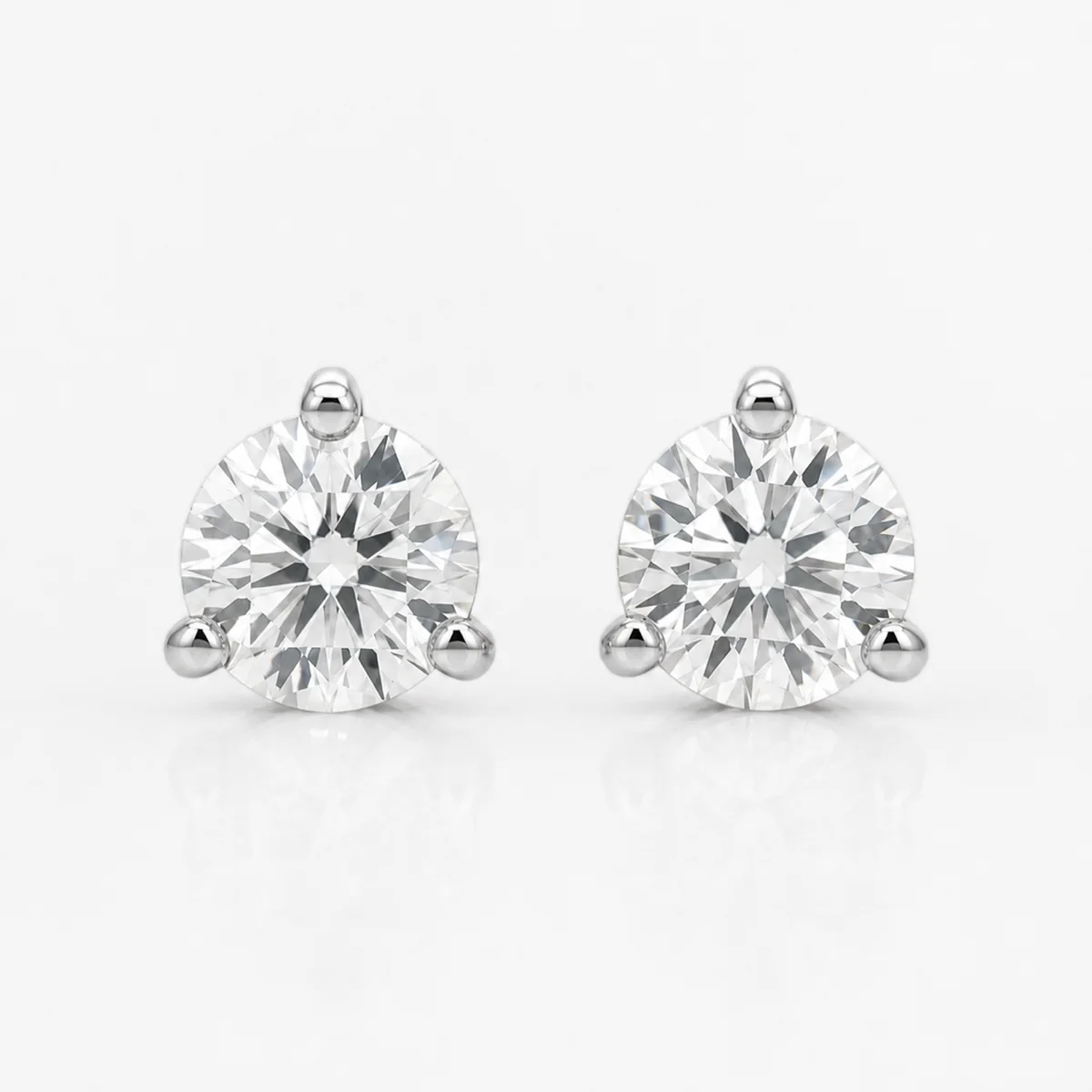 Martini studs diamond earrings in platinum, round diamond, made to order by Prodiam (rendered design reference)