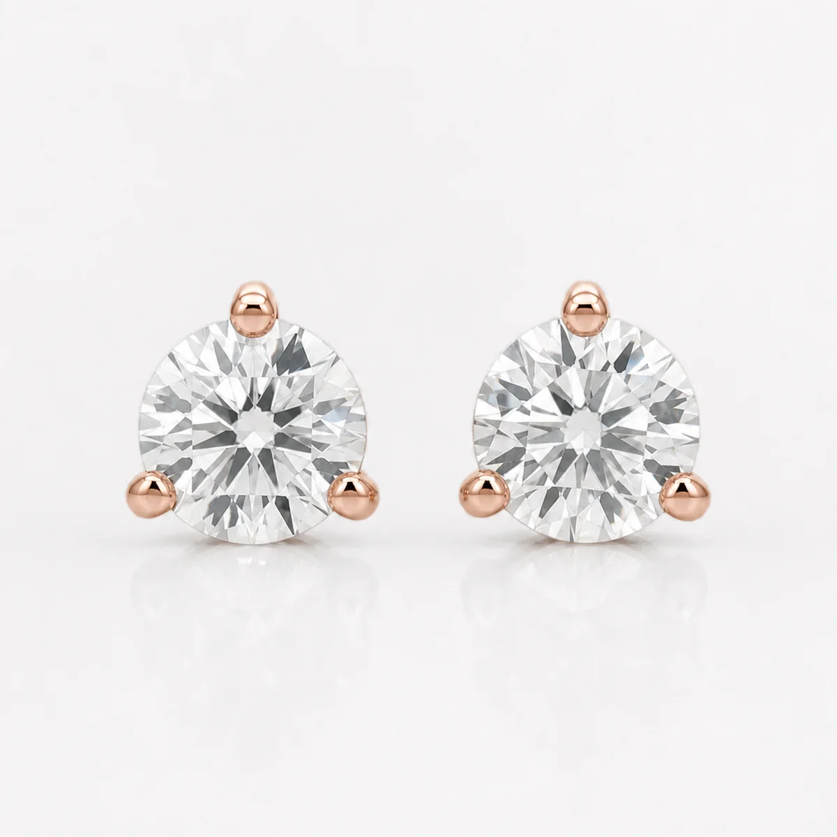 Martini studs diamond earrings in 18k rose gold, round diamond, made to order by Prodiam (rendered design reference)