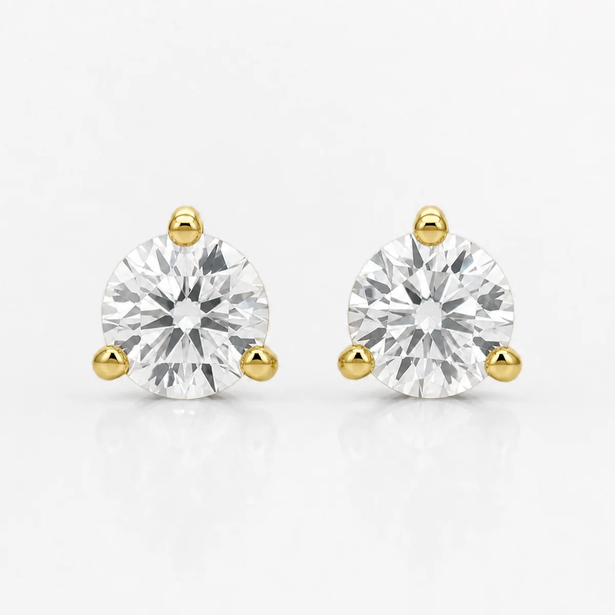 Martini studs diamond earrings in 18k yellow gold, round diamond, made to order by Prodiam (rendered design reference)