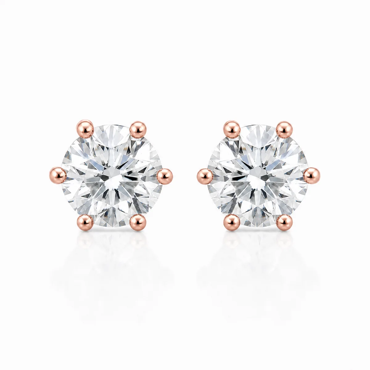 Six-claw studs diamond earrings in 18k rose gold, round diamond, made to order by Prodiam (rendered design reference)