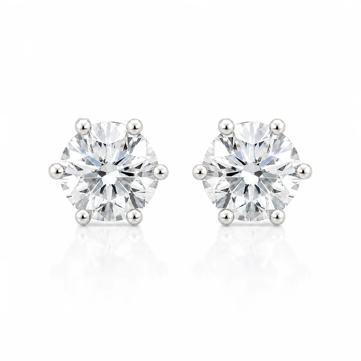 Six-claw studs diamond earrings in 18k white gold, round diamond, made to order by Prodiam (rendered design reference)
