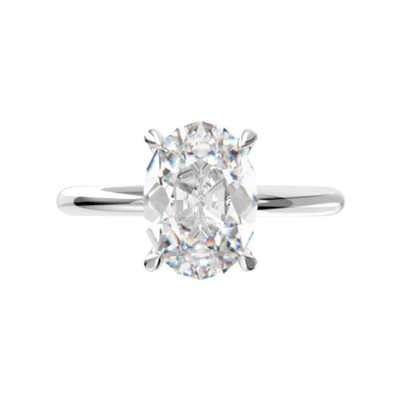 1.58 ct oval diamond engagement ring with a hidden halo in 18k white gold, made to order by Prodiam in Bedfordview