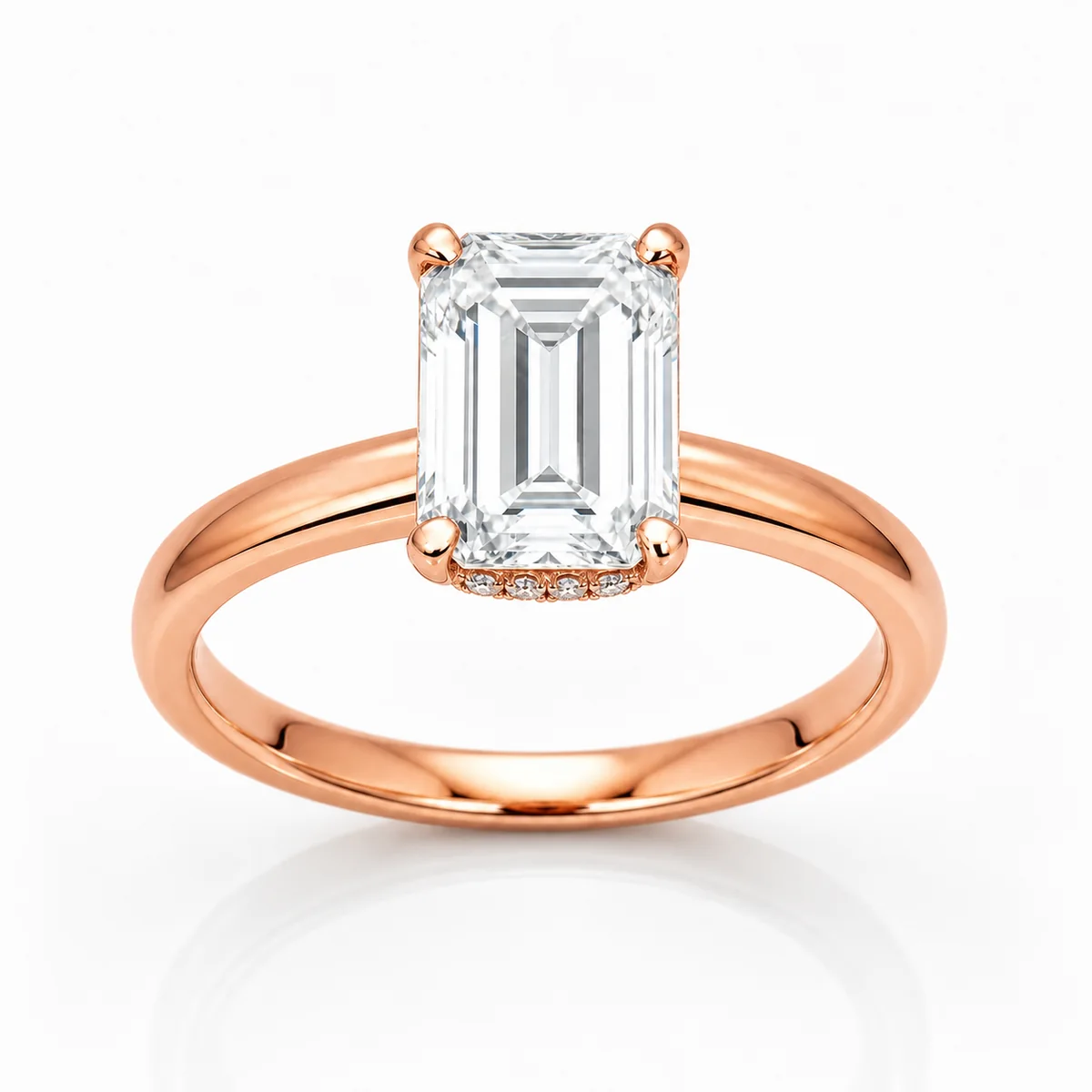 Emerald cut hidden halo engagement ring in 18k rose gold, made to order by Prodiam (rendered design reference)