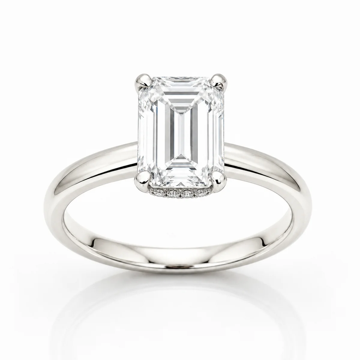Emerald cut hidden halo engagement ring in 18k white gold, made to order by Prodiam (rendered design reference)