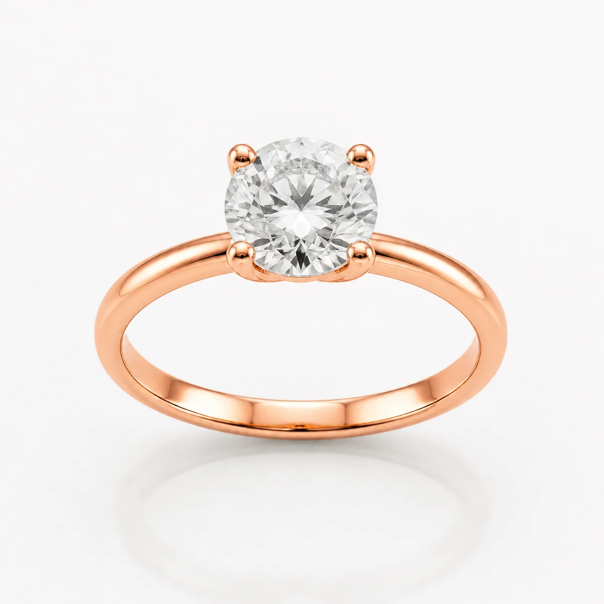 Four-claw solitaire engagement ring in 18k rose gold, round diamond, made to order by Prodiam (rendered design reference)