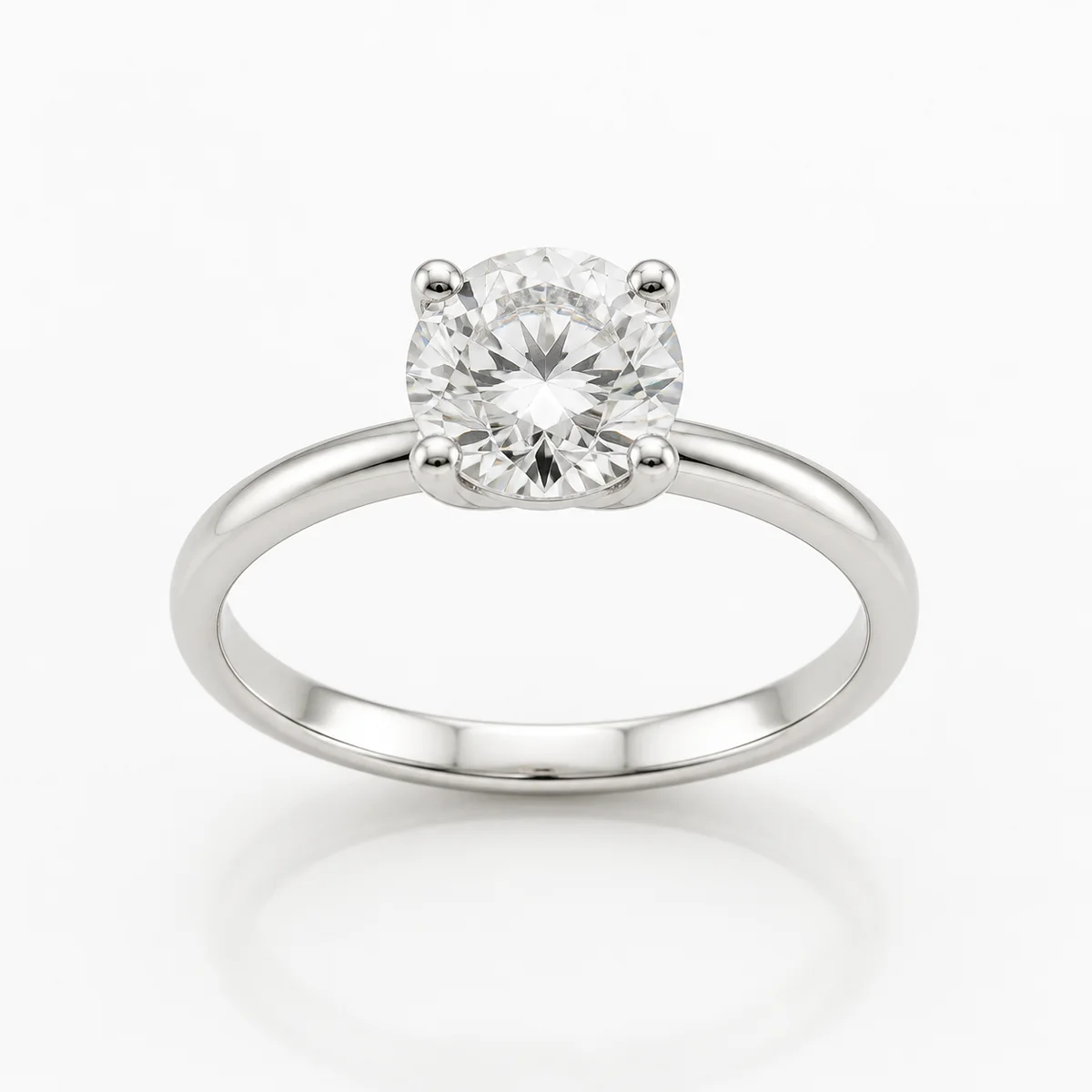 Four-claw solitaire engagement ring in 18k white gold, round diamond, made to order by Prodiam (rendered design reference)