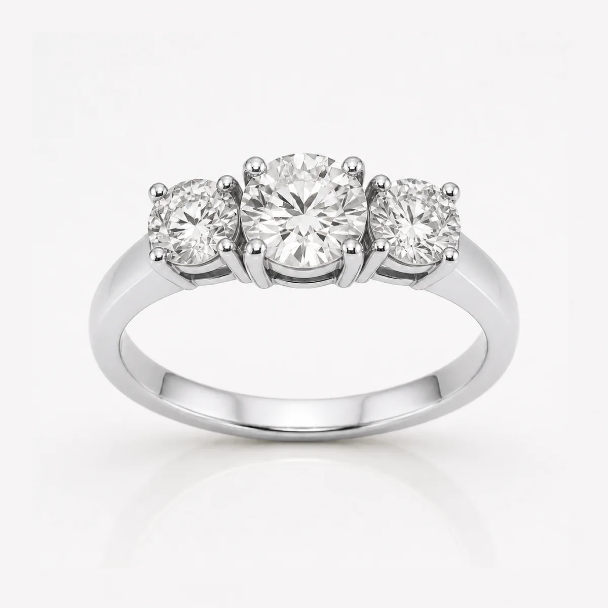 Round trilogy engagement ring in platinum, made to order by Prodiam (rendered design reference)