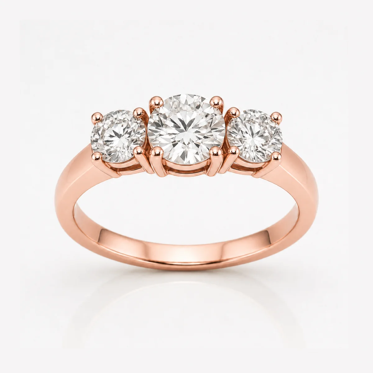 Round trilogy engagement ring in 18k rose gold, made to order by Prodiam (rendered design reference)