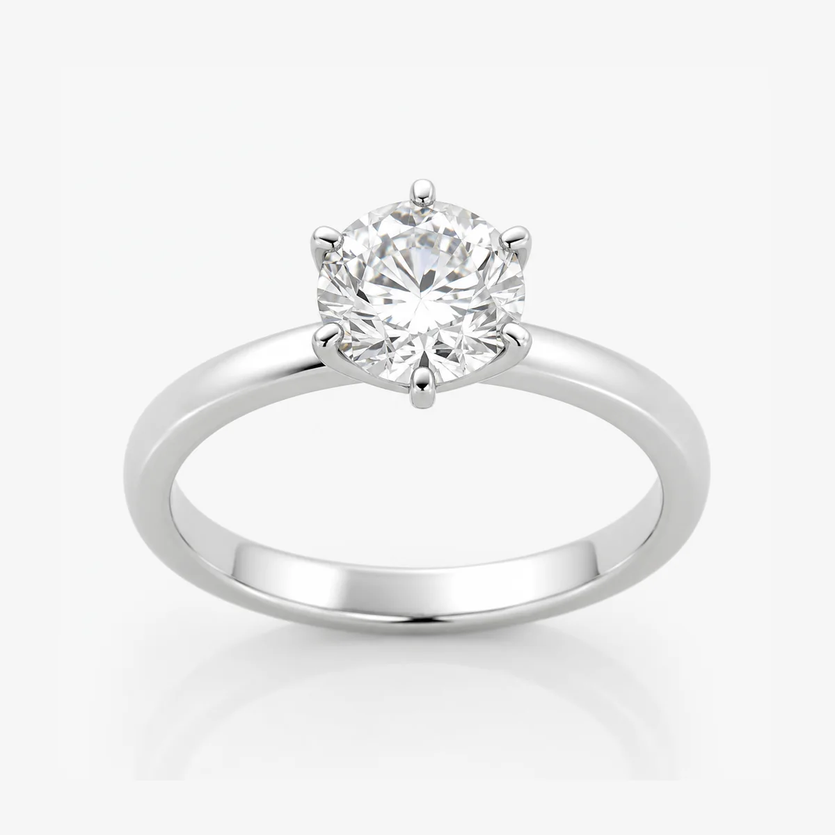 Six-claw solitaire engagement ring in platinum, round diamond, made to order by Prodiam (rendered design reference)
