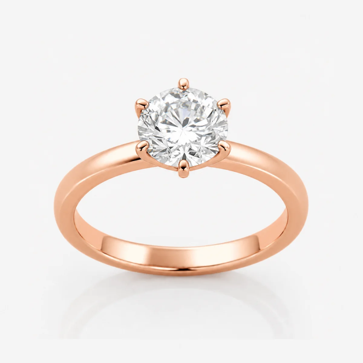Six-claw solitaire engagement ring in 18k rose gold, round diamond, made to order by Prodiam (rendered design reference)
