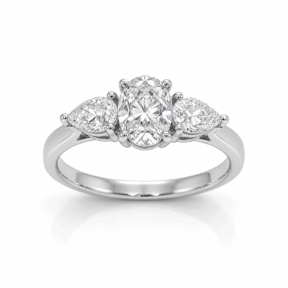Three-stone pear sides engagement ring in platinum, oval diamond, made to order by Prodiam (rendered design reference)
