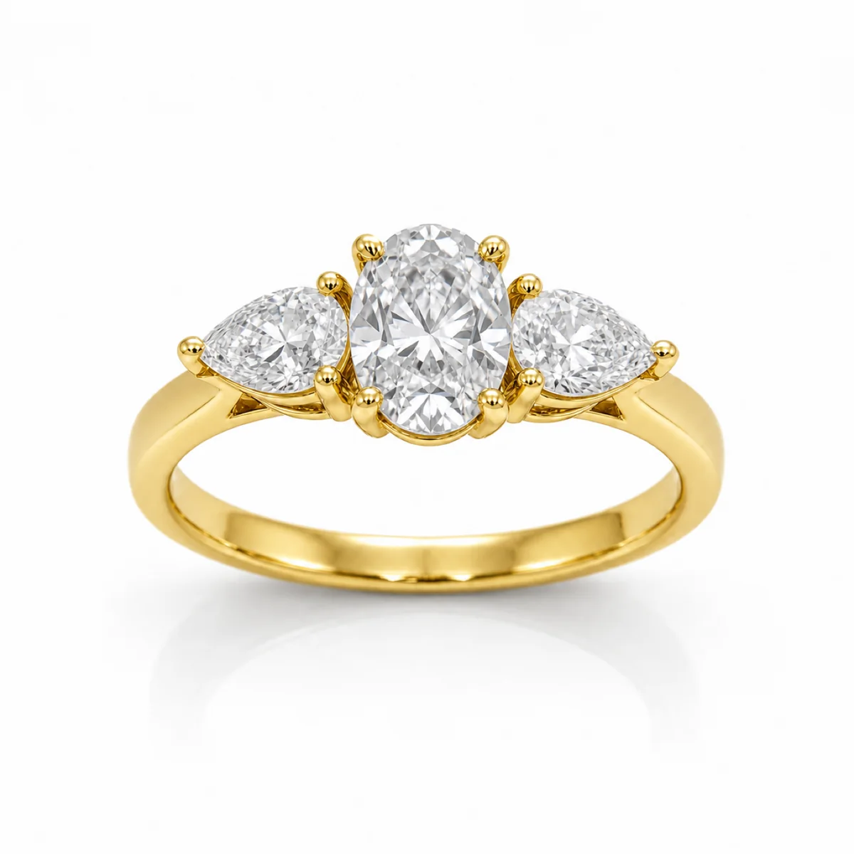 Three-stone pear sides engagement ring in 18k yellow gold, oval diamond, made to order by Prodiam (rendered design reference)