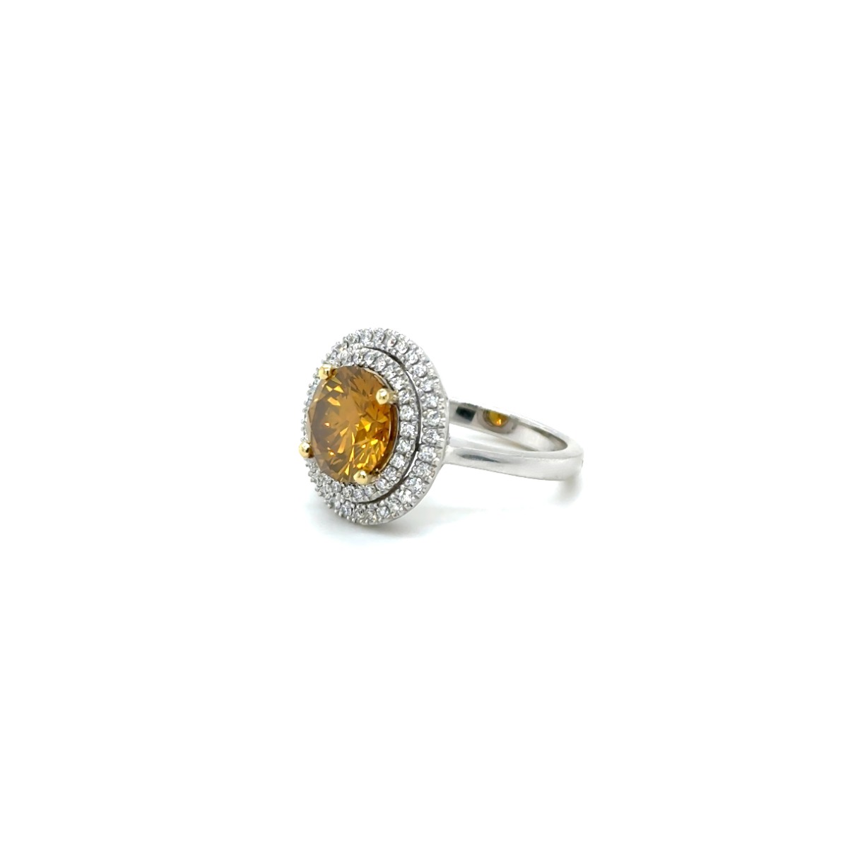 2.53Ct Double Halo Diamond Ring · 2.53 ct, Round Brilliant, Natural Fancy Deep Orange-Yellow colour, GIA certified, 18Kt White Gold · alternate angle, photographed at the Bedfordview viewing room