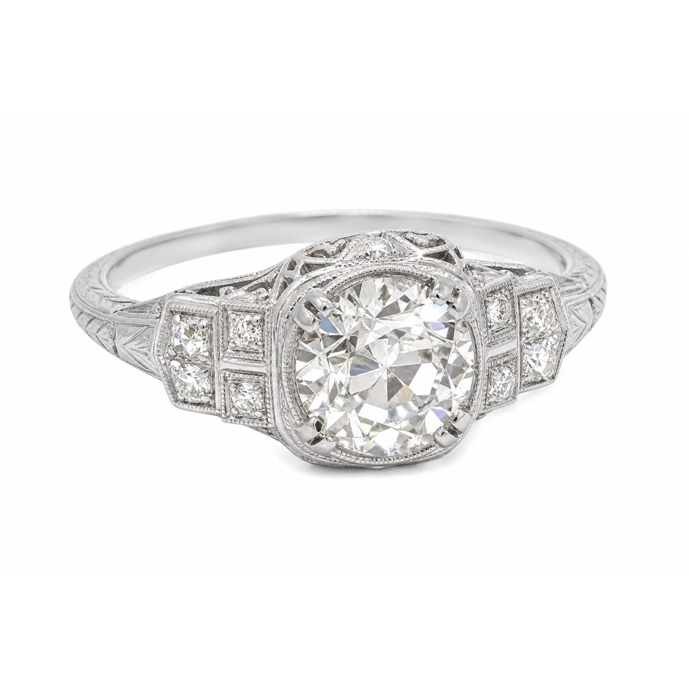 Vintage Art-Deco style diamond engagement ring with milgrain, filigree and diamond-set shoulders, made to order at Prodiam, Bedfordview